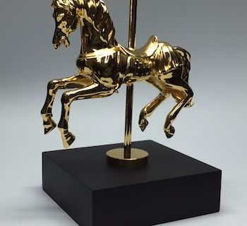 Metallguss-Trophäe "Goldenes Karusellpferd"